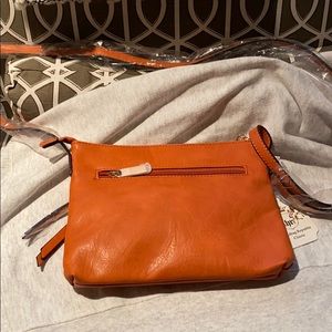 Brand new Rust colored bag.